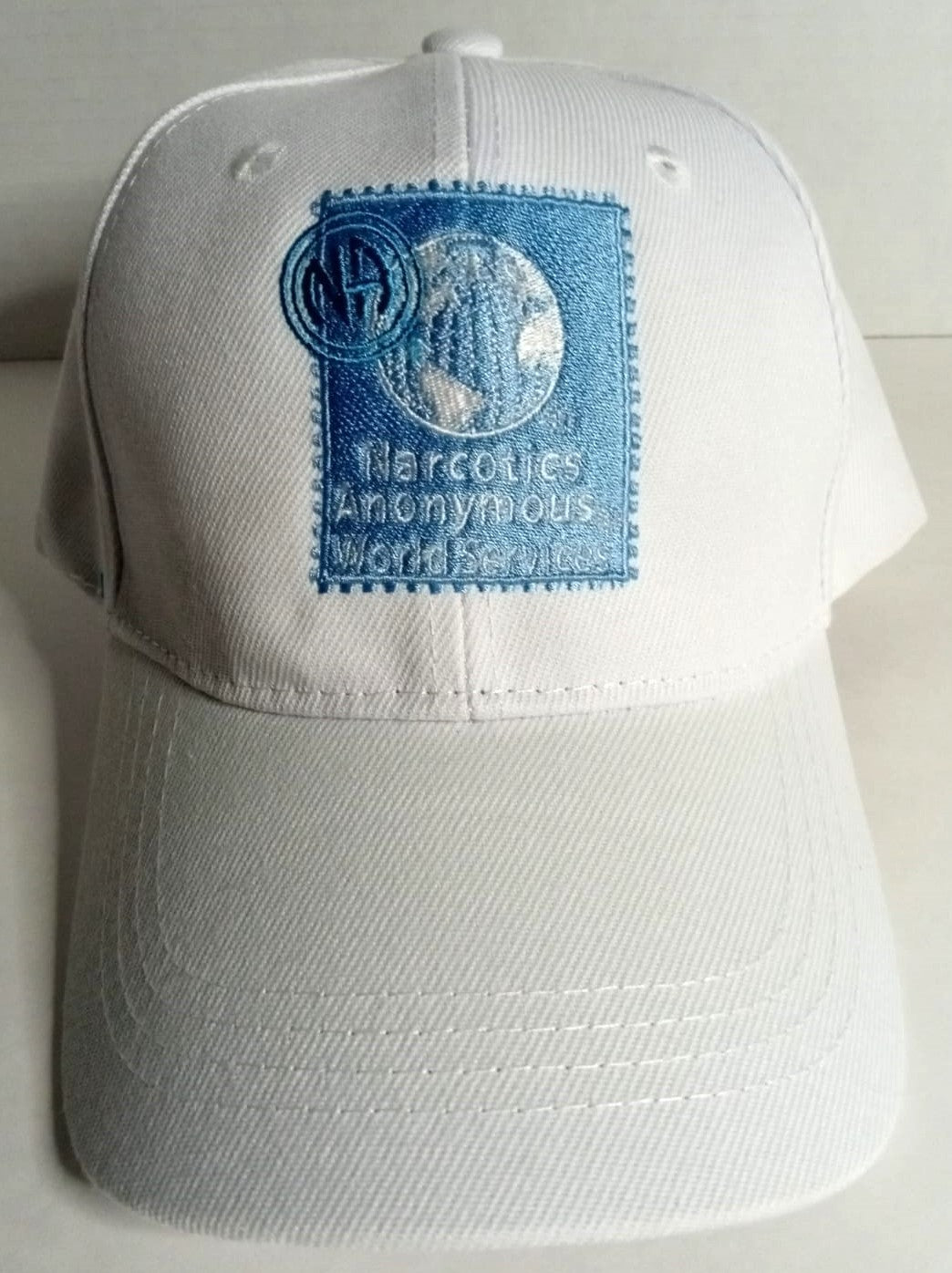 NA "WORLD SERVICE" Caps Top Hat Designs