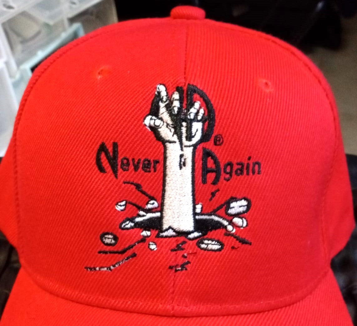 "NEVER AGAIN" Caps